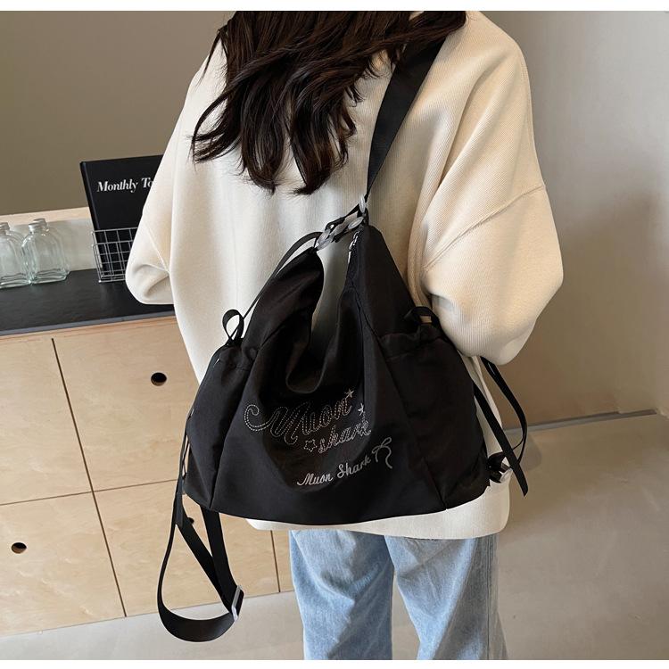Tote bag women's 2024 new large-capacity commuting letter foreign feeling college students commute to class shoulder backpack
