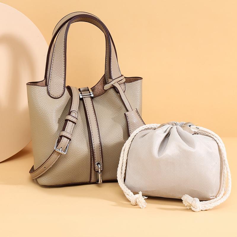 The top layer of cowhide women's bag, high-end leather bucket bag, handbag bag, commuter lychee pattern one-shoulder crossbody mom bag