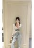 Trendy European Knit V-Neck Cardigan with Embroidered Patch and Contrasting Edges