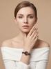 Gedi Women's Retro Waterproof Watch with Smooth Metal Beaded Strap and Exquisite Round Dial.