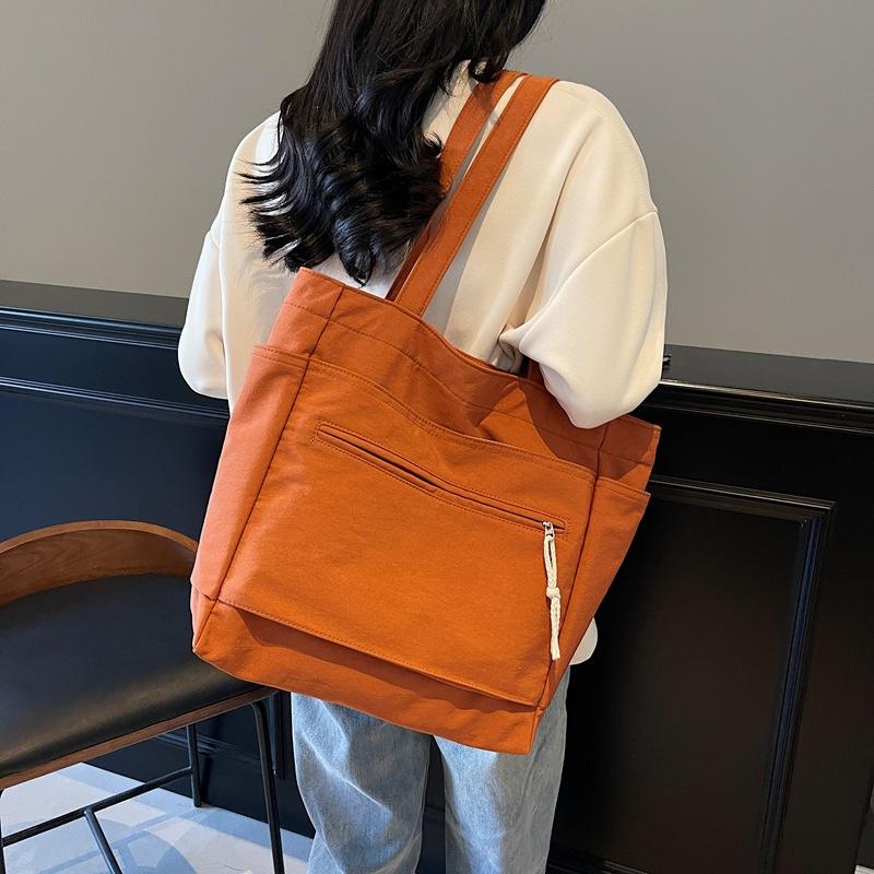 New Large-capacity Business Commuting Fashion New Large-capacity Soft Surface Solid Color Canvas Shoulder Bag