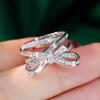 Huitan Ästhetischer Schleifenförmiger Ring für Damen Party Hochzeit Ausgefallener Fingerzubehör Mode Vielseitiger Schmuck Eingelegt Glänzender CZ