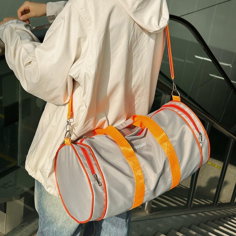 The same style for men and women, trendy and fashionable, going out for travel, large-capacity hand luggage, student school clothes storage bag