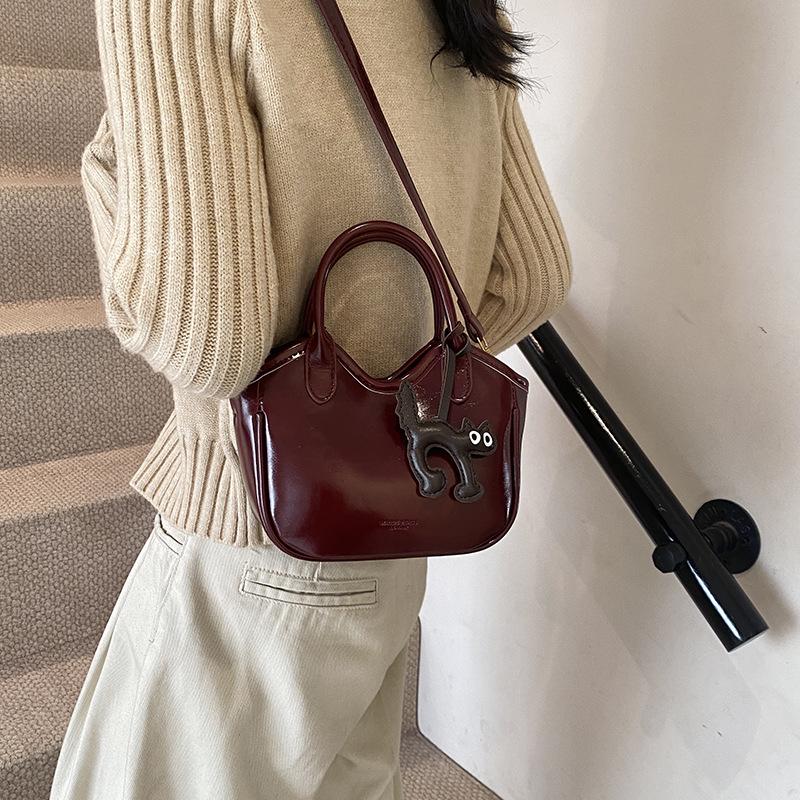 

Сумка из вощеной кожи премиум-класса 2025 г.: Женская сумка через плечо, сумка-мессенджер и сумка-тоут на осень/зиму 24 x 8 x 16 cm