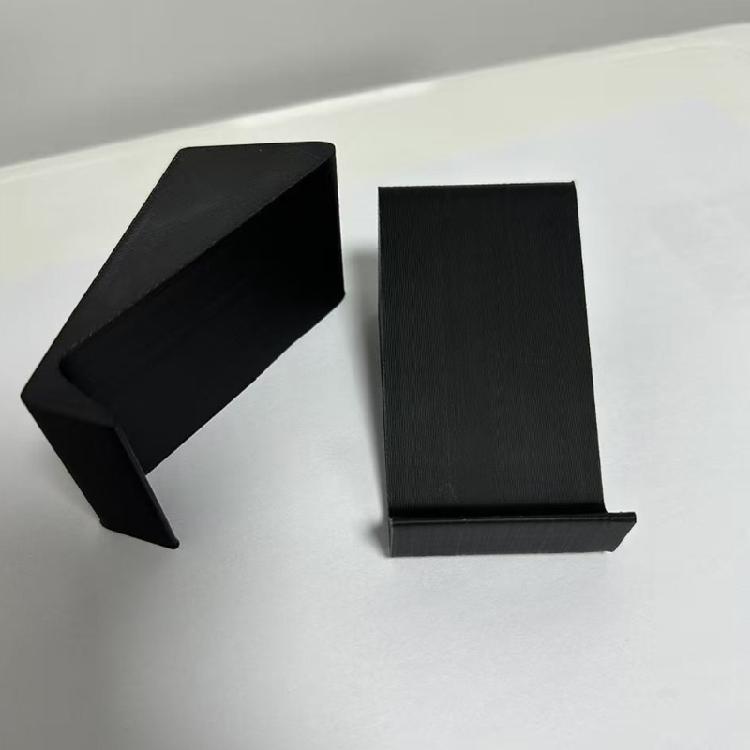 Speaker Tilt Risers for Desktop Use, Pair of Black Inclined Supports with Raised Front Lip and No Separate Mounting Parts