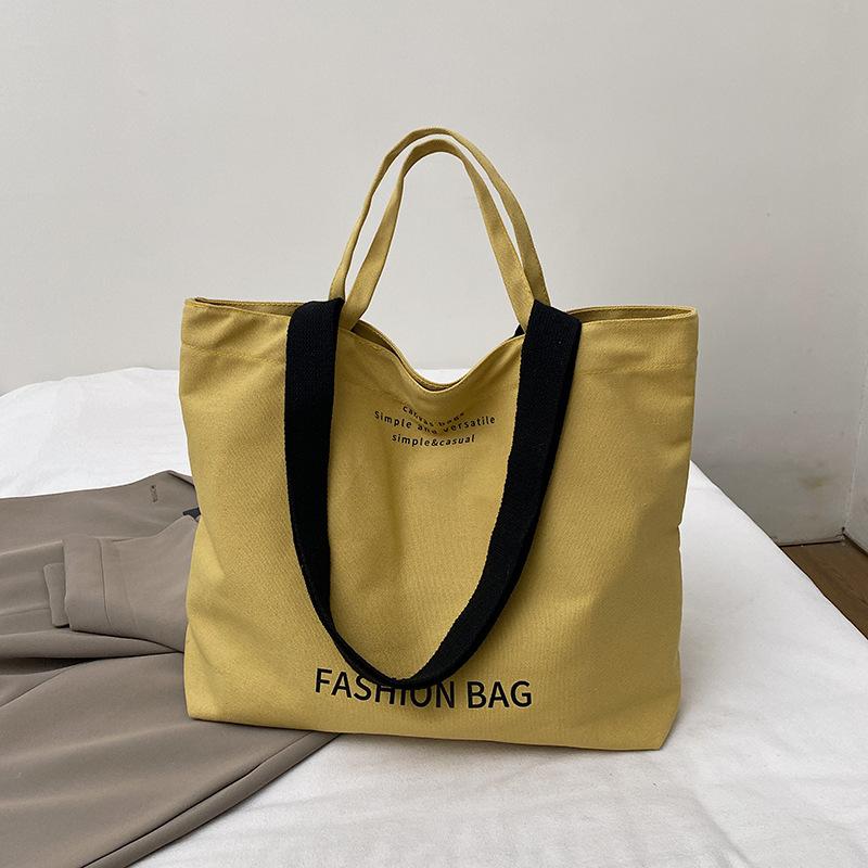 

Новая холщовая женская сумка Корейская уличная трендовая сумка-тоут с простыми и универсальными надписями и большой вместимостью, на плечо, через плечо жёлтый