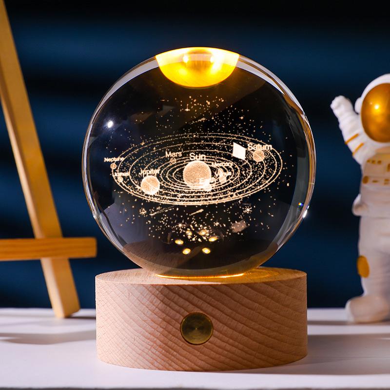Flickering Crystal Ball Night Light with Engraved Solid Wood Base - Perfect as a Birthday Gift or Creative Graduation Ornament.