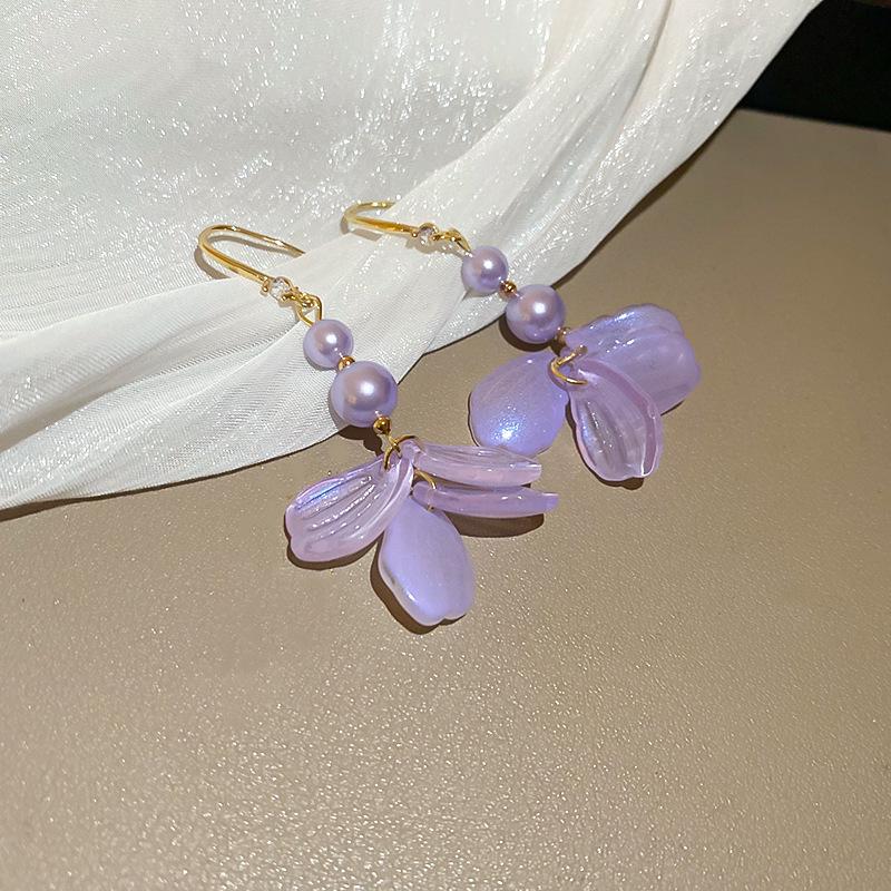 Boucles d'oreilles bohèmes roses à fleurs de perles de rocaille et pompons de perles