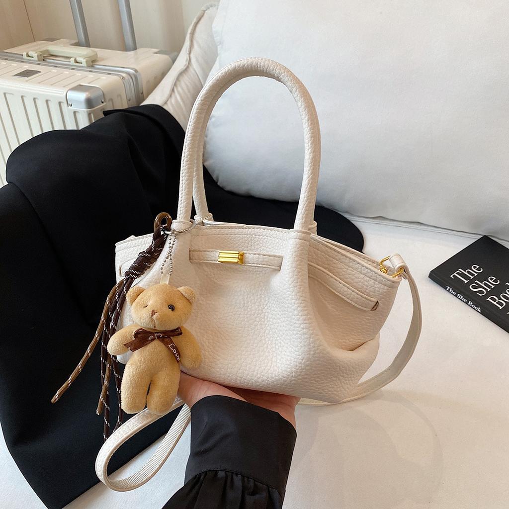 Retro solid color design bear pendant 2025 new high-end pleated dumpling bag handbag messenger bag bag female