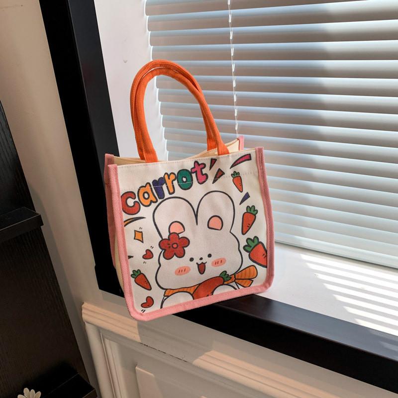 

Trendy Cartoon Design Large Capacity Tote Bag Ideal For Everyday Use And Fashion помаранчевий