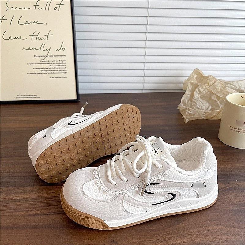 Fashion casual simple versatile flat-soled sports shoes women's autumn new niche board shoes student Xiaobai