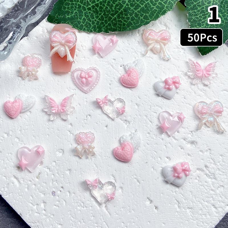 50Pcs Pink Series Bow Heart Resin Nail Charms 3D Luminous Double Butterfly Peach Heart Sweet Wind Nail Art Decorations DIY Nails