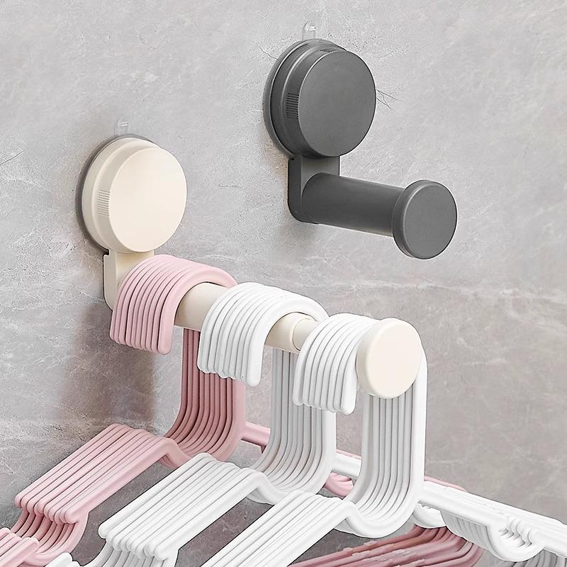 Retractable Wall-Mounted Clothes Rack: Multi-Functional, Seamless, No Punching, with Suction Cup Hangers for Balcony Storage