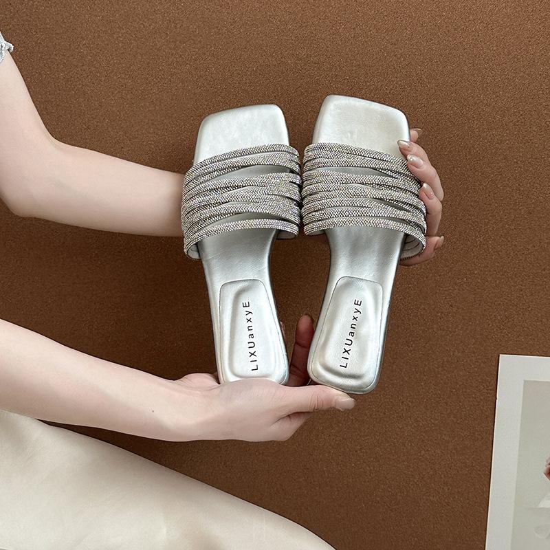 Premium flat-bottomed one-word drag shoes summer French beautiful outer wear with skirt casual beach women's wedge heel sandals