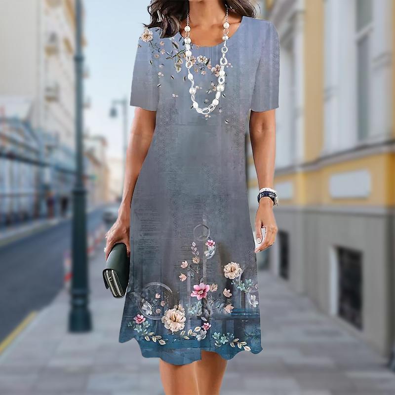 

Модное женское свободное изящное платье-трапеция с цветочным принтом и коротким рукавом и принтом листьев L синий