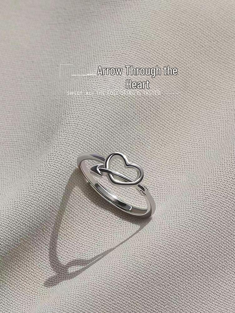 

Elegant Heart-Piercing Ring for Women - Stylish Hollow Heart Design, Perfect for Engagement or Everyday Wear.