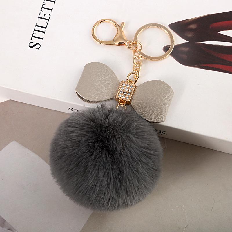 Faux Fur Pom Pom Keychain Women Girls Plush Ball Bag Backpack Pendant Creative Rhinestone Pu Leather Bow Car Keyring GiftS