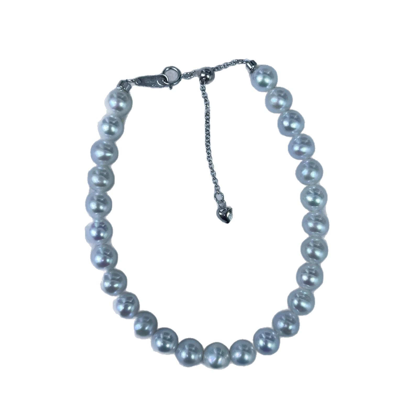 

Браслет из пресноводного жемчуга Чжуцзи: Жемчуг почти круглой формы 6-7 мм, сильный блеск, простой, универсальный дизайн с белым жемчугом на стерлинговом серебре S925 для женщин. 6-7mm Near Round, Strong Luster, Slight Blemish