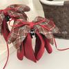Embroidered Satin Bow Ponytail Clip - A Fashionable and Versatile Hairpin for Updos.