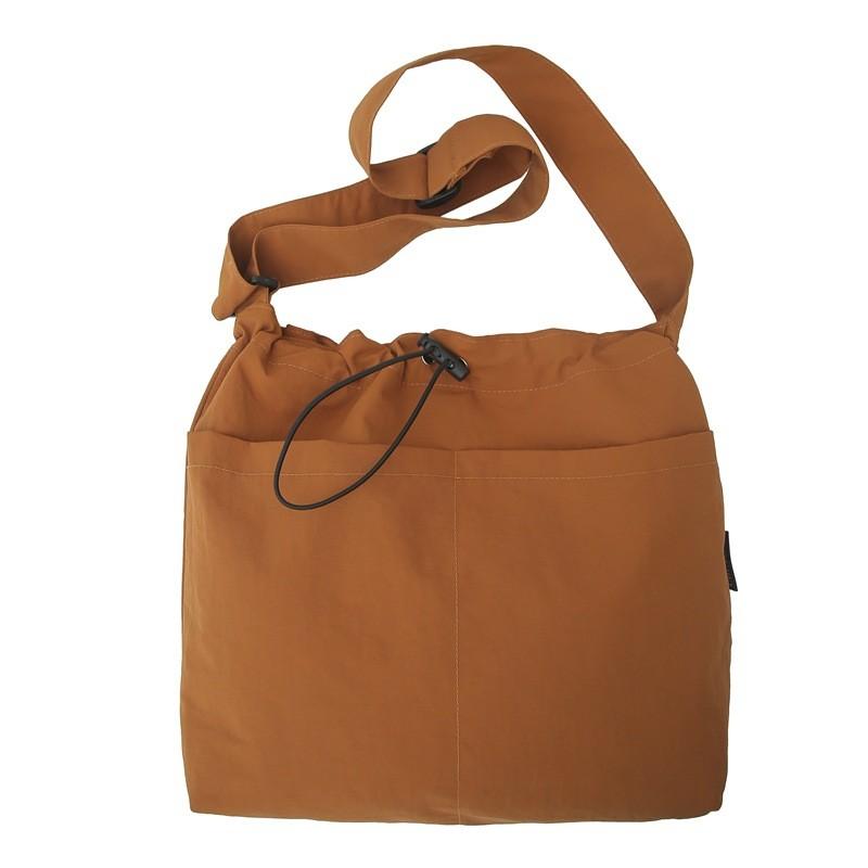 Nylon Casual Bucket Bag For Travel And Leisure With Drawstring Closure For Men And Women
