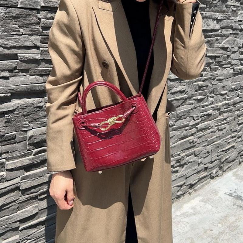 2026 New Leather Women's Bag Fashion Trendy Crocodile Pattern Stone Pattern Woven Butterfly Buckle Commuter Tote Small Bag Cross-border