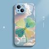 Golden flash four-leaf clover is suitable for Apple 16promax mobile phone case iPhone15/14 new cartoon 13 glass case.