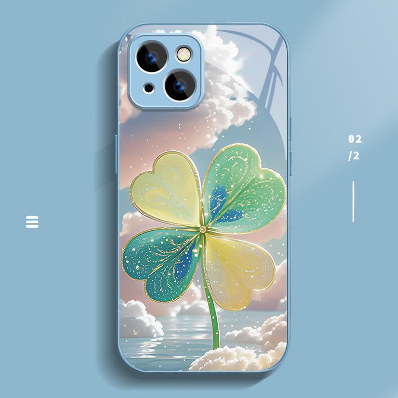 Golden flash four-leaf clover is suitable for Apple 16promax mobile phone case iPhone15/14 new cartoon 13 glass case.