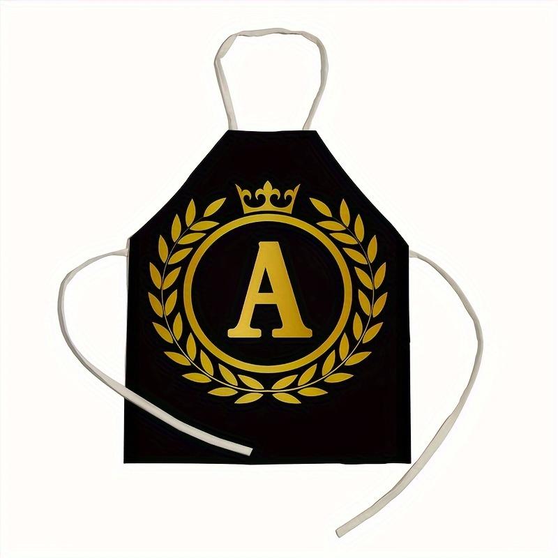 1 personalized letter apron with golden crown print on a black background, suitable for kitchen baking and barbecue