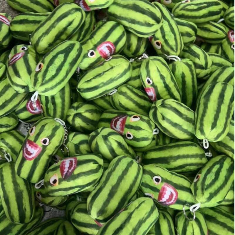 A cucumber watermelon keychain with gums that resembles you, a blind man