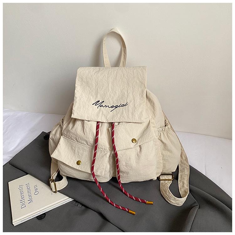 

Casual multi-pocket backpack women s 2025 new large-capacity canvas short-distance travel backpack student school bag