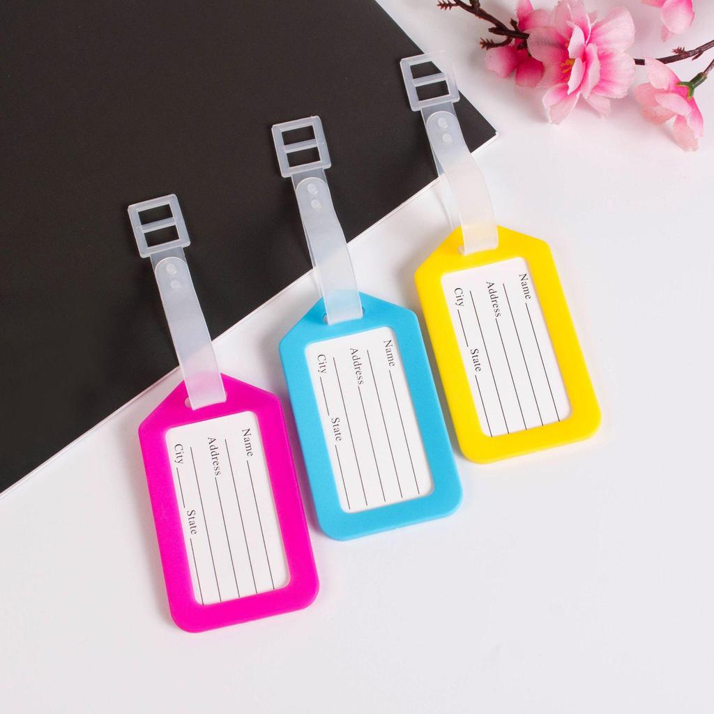 Airplane Luggage Tag Identifier: Suitcase Name & Boarding Pass Label.