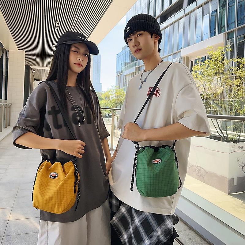 Summer messenger bag waterproof nylon cloth bucket mobile phone bag women's new simple large-capacity outdoor commuter bag