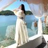 Bali Thailand travel vacation photo French one-word collar rough edge design top + large swing skirt two-piece set