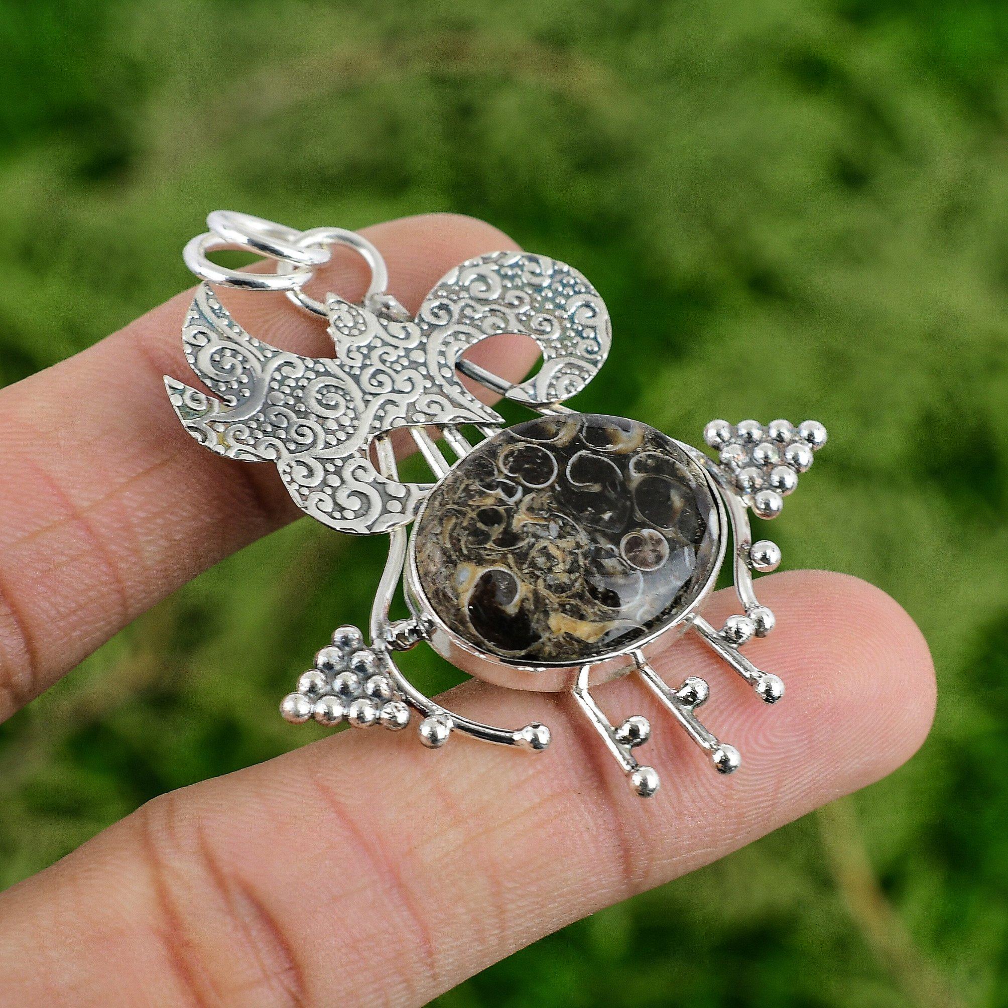 

Daughters Day Deal Oval Natural Turritella Agate Sterling Silver Bezel Pendant