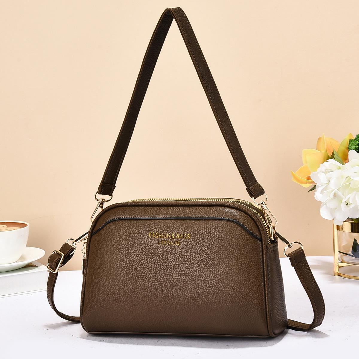 

Корейская версия легкой роскошной высококачественной мягкой прочной модной изысканной легкой сумки через плечо для通勤 и активного отдыха кофейный