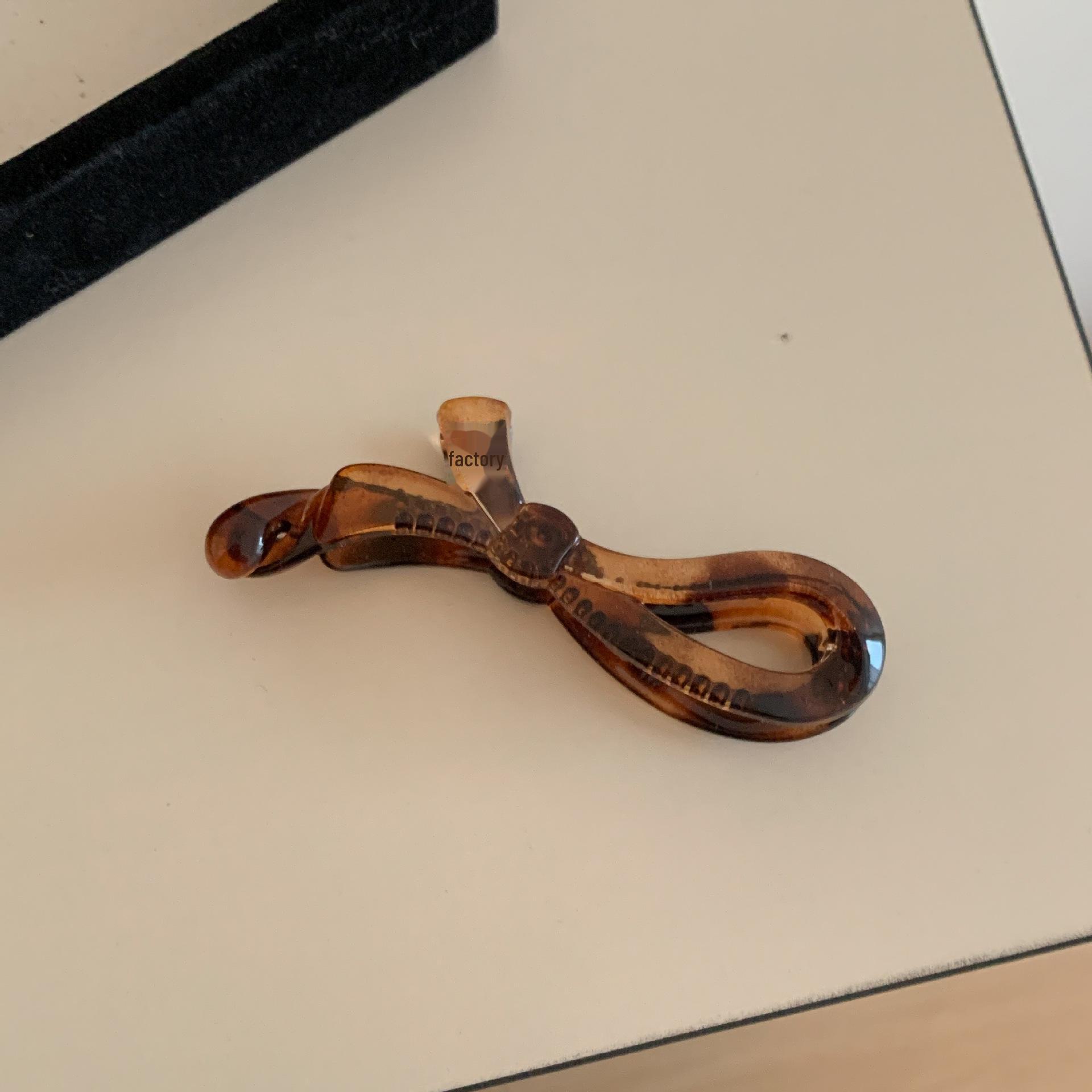 

Корейская заколка для волос с цветочным принтом в виде банана — элегантный, нескользящий, вертикальный аксессуар для хвоста