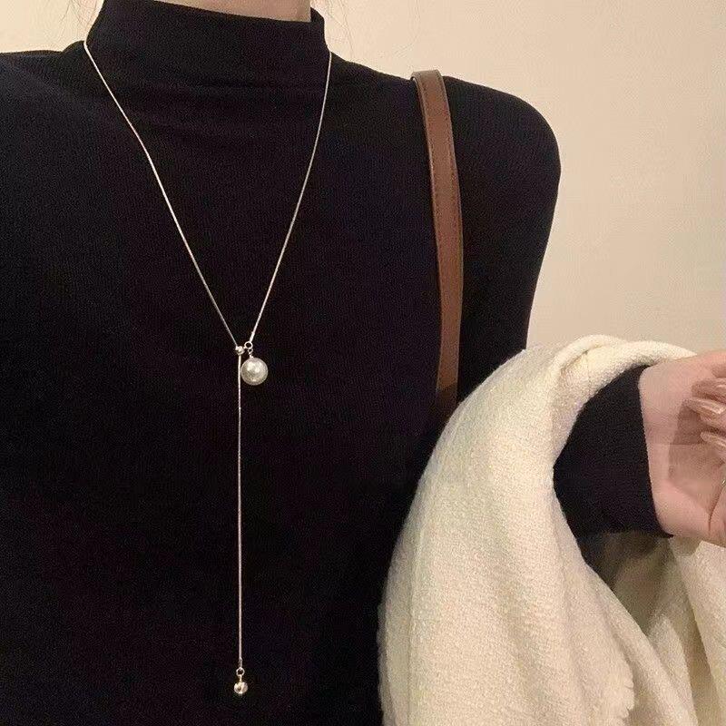 Korean Pearl Necklace: High-End Silver Clavicle Chain with Niche Design, Perfect for Light Luxury and Sweater Pendants.