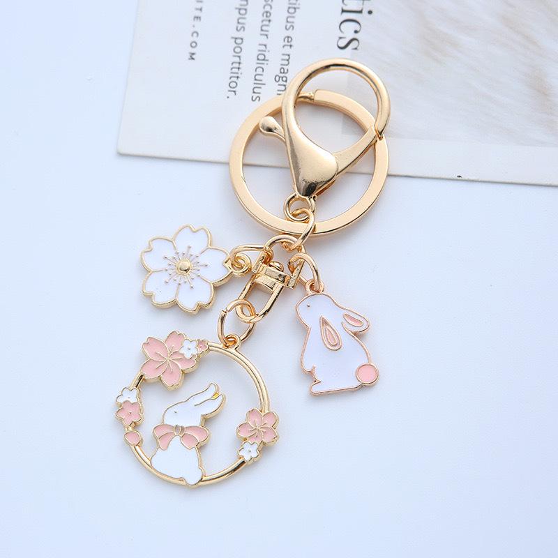 

Adorable Pink Flower Rabbit Keychain | Charming Cartoon Alloy Accessory for Girls Bags & Car Keys