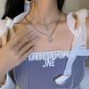 "European & American Double-Layer Love Necklace: Hip-Hop Inspired Long Sweater Chain for Women"