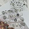 Tomoni Metal Nail Stickers: DIY Dark Style with Star, Moon, and Heartbeat Designs.