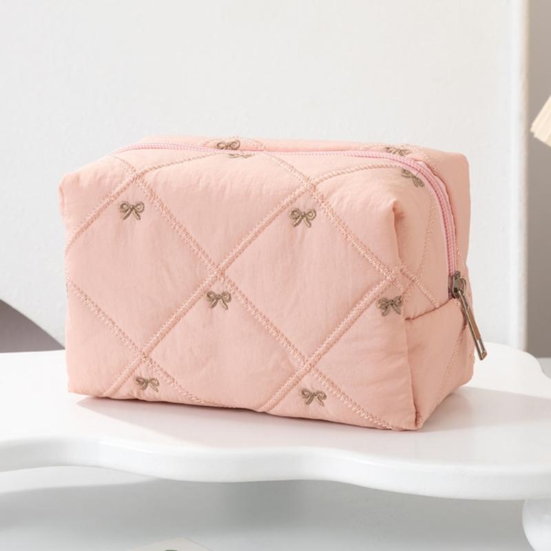Large Capacity Makeup Organizers with Quilted Bowknot Accent and Multiple Divisions for Efficient Travel