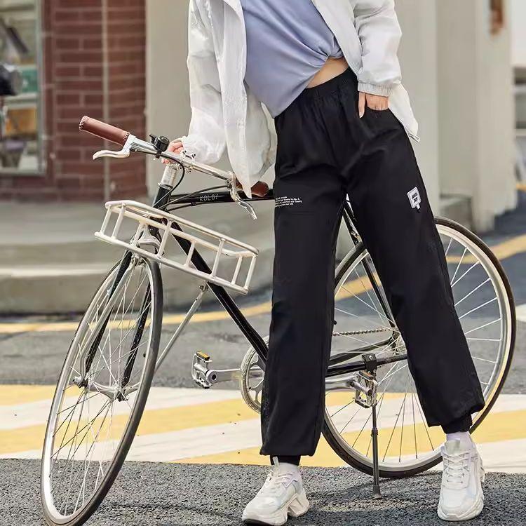 Anta Solid Color Woven Loose Sports Pants Women Bottoms Black 962238503-1