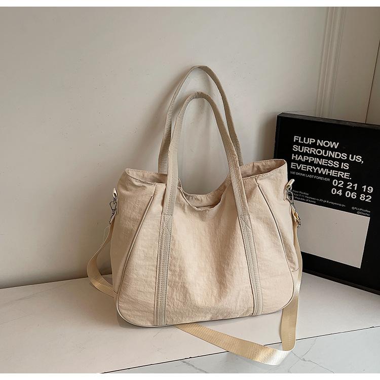 

Korean version ins fashionable large-capacity canvas tote bag handbag women s new casual literary shoulder messenger bag