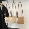 Simple Solid Color Woven Women Casual Shoulder Crossbody Bag With Pendant For Casual Beach Vacation And Daily Use