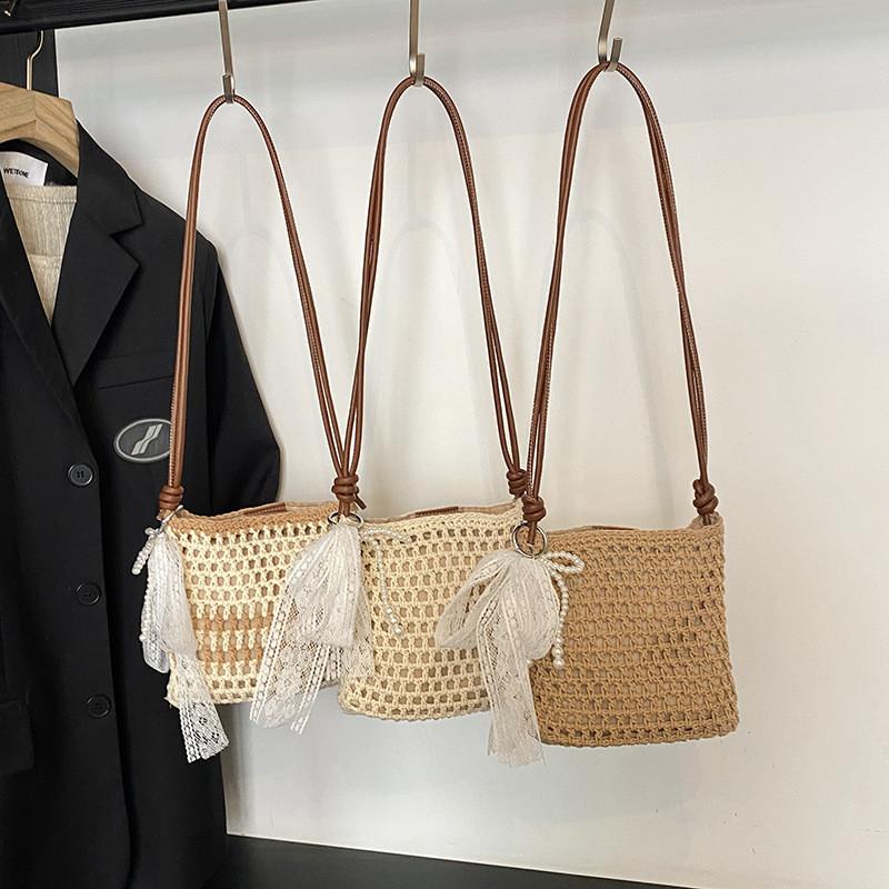 Simple Solid Color Woven Women Casual Shoulder Crossbody Bag With Pendant For Casual Beach Vacation And Daily Use