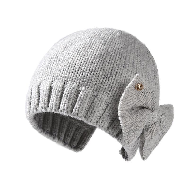Women's Pure Wool Knitted Hat with Bow - Warm, Fashionable, Ear-Protecting, and Face-Slimming for Autumn and Winter