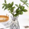 Decoração de casa – Flores e coroas artificiais