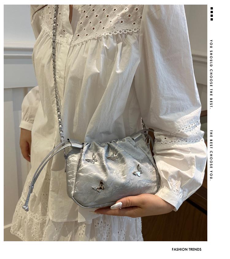 High-End Women's Metallic Bow Bucket Bag - Autumn 2024 Niche Fashion Drawstring Style