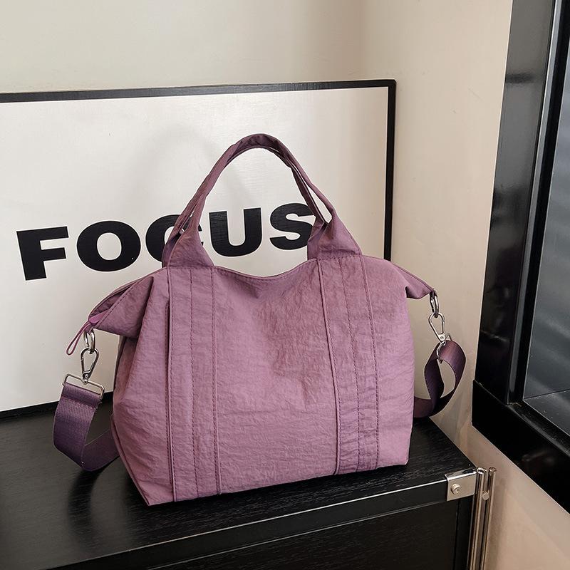 

Japanese-style minimalist tote bag, versatile2026New model large-capacity canvas tote bag for women, shoulder and crossbody hand фіолетовий