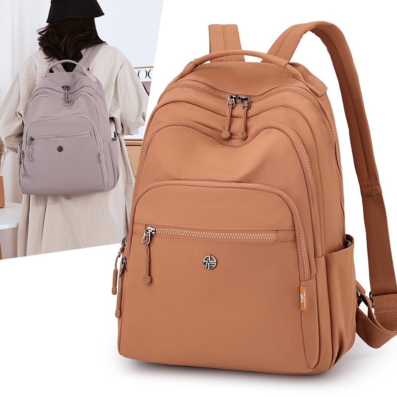 Zaino impermeabile per la scuola zaino da donna 1011 nuovo grande capacità borsa per studenti da viaggio all'aperto zaino leggero per il tempo libero per il pendolarismo zaino per computer